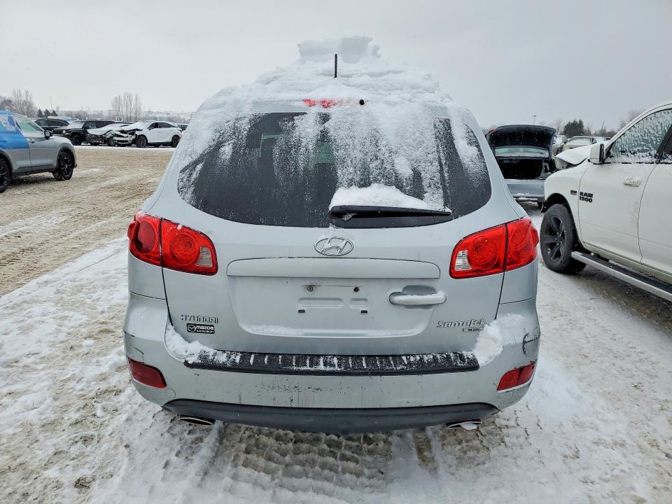 Photo 6 from auction – 2009 HYUNDAI SANTA FE with VIN 5NMSG13E59H309753