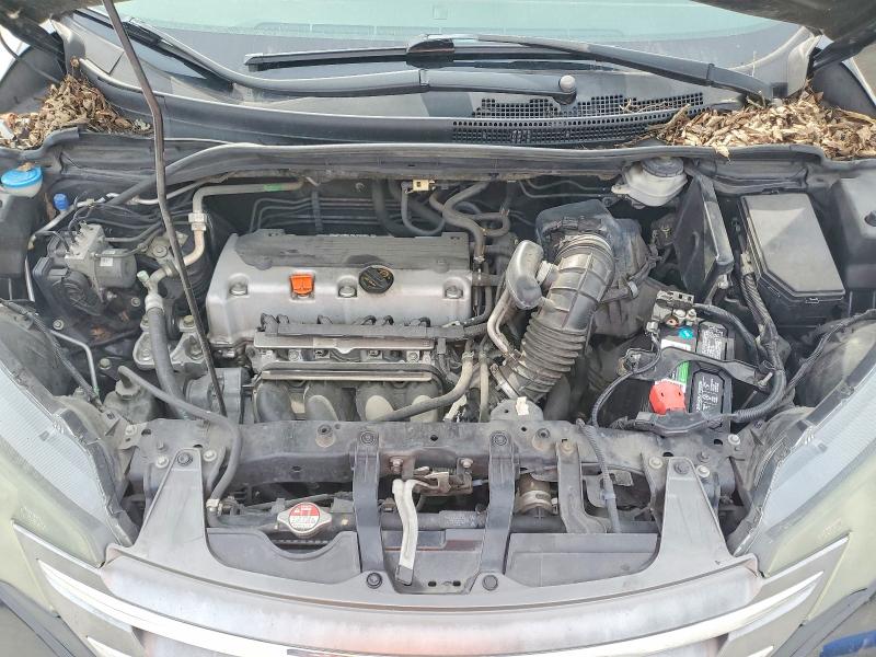 Photo 12 from auction – 2014 HONDA CR-V with VIN 3CZRM3H38EG708604