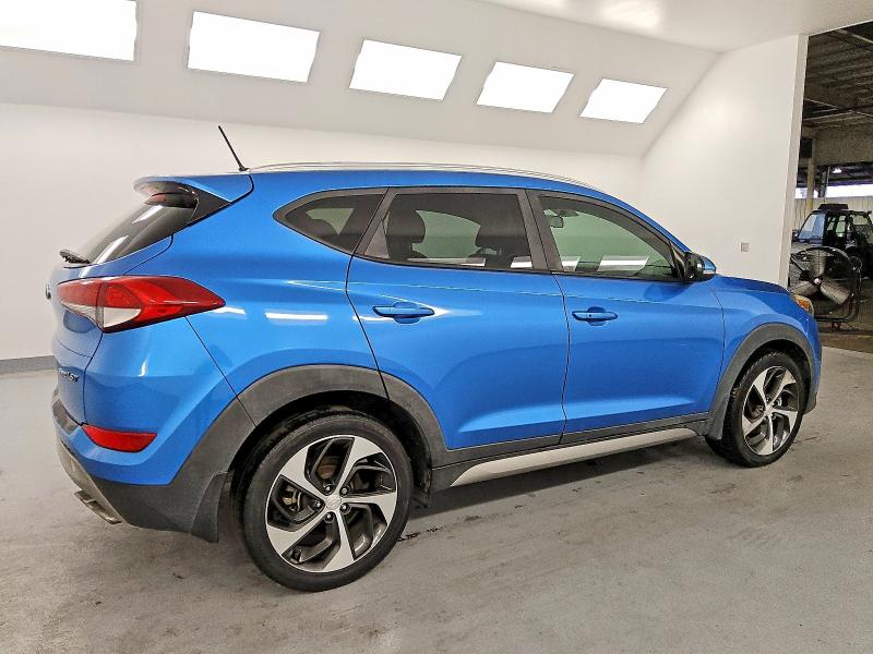 Photo 3 from auction – 2017 HYUNDAI TUCSON with VIN KM8J33A25HU355050