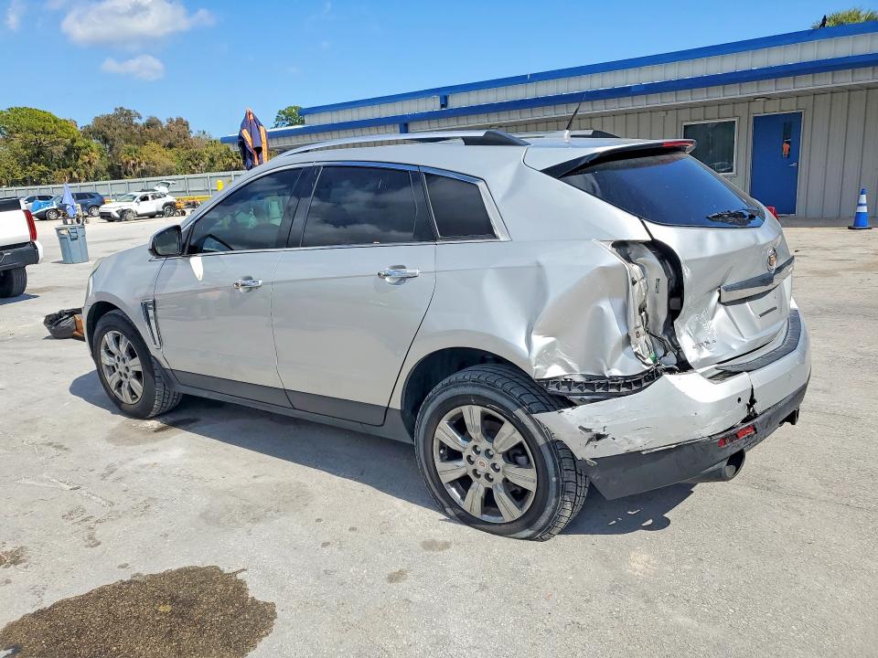 Photo 2 from auction – 2014 CADILLAC SRX LUXURY with VIN 3GYFNEE35ES667734