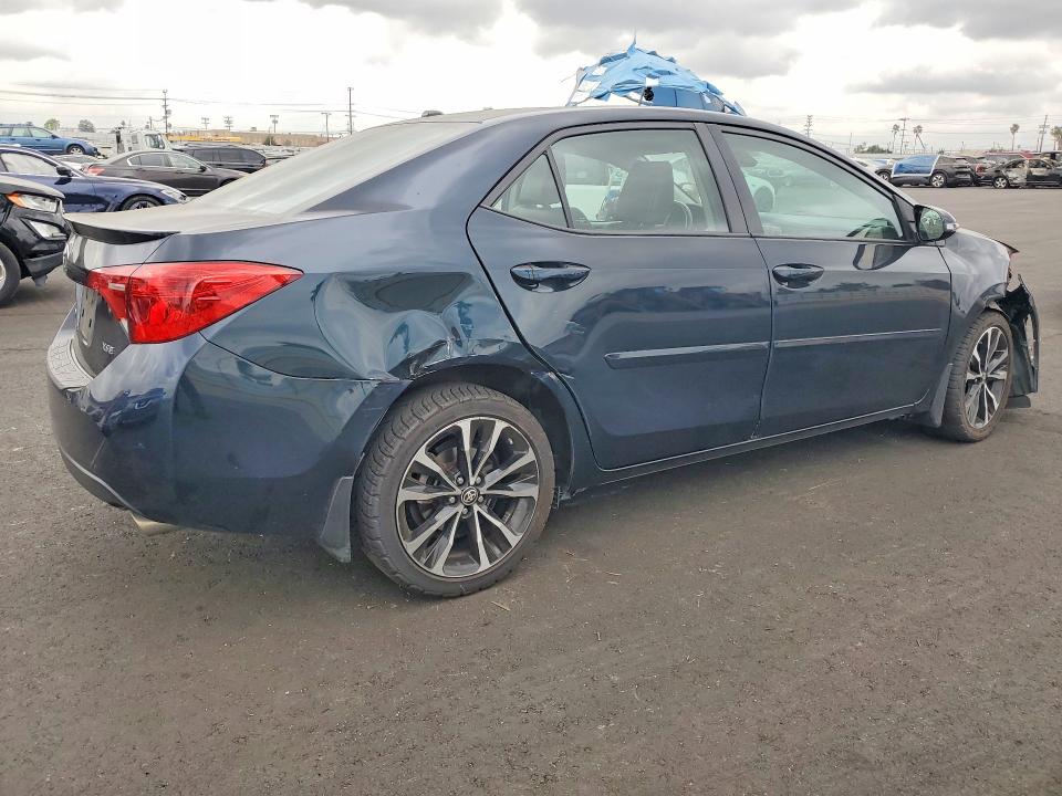 Photo 3 from auction – 2017 TOYOTA COROLLA L with VIN 5YFBURHE3HP702204