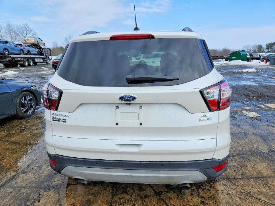 Photo 6 from auction – 2017 FORD ESCAPE with VIN 1FMCU9GD6HUD47878