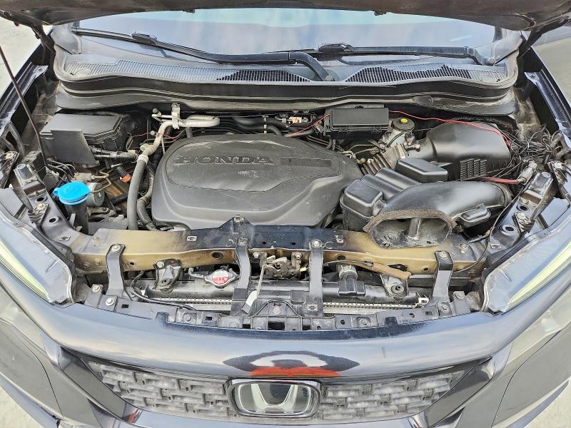 Photo 12 from auction – 2021 HONDA PASSPORT with VIN 5FNYF8H58MB011142