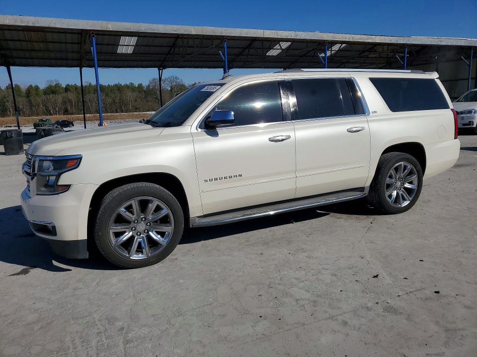 CHEVROLET SUBURBAN 2015 with VIN 1GNSCKKC0FR166517 - Photo from auction