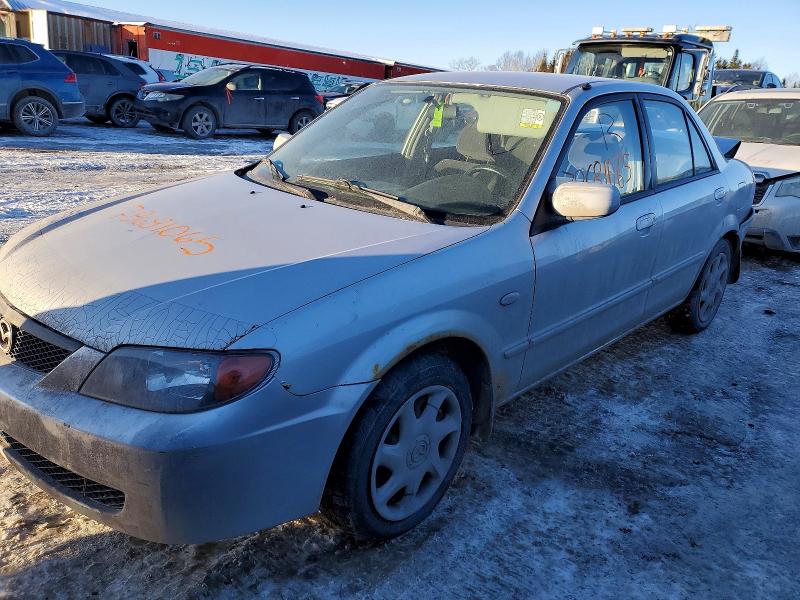 MAZDA PROTEGE 2003 with VIN JM1BJ225730205765 - Photo from auction