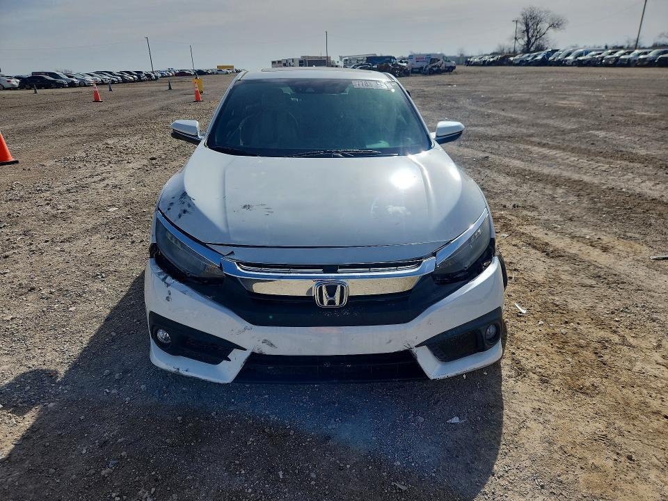 Photo 5 from auction – 2017 HONDA CIVIC with VIN 2HGFC3B90HH357072
