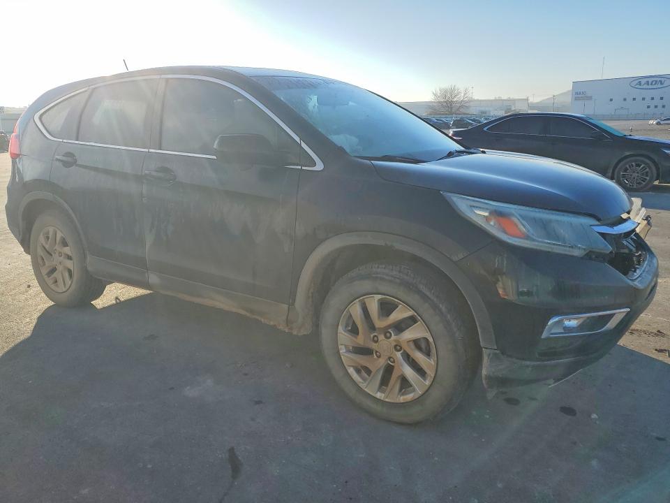 Photo 4 from auction – 2015 HONDA CR-V with VIN 2HKRM3H53FH541925