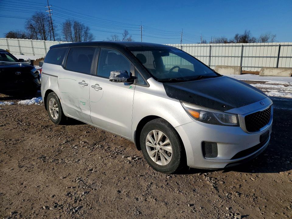 Photo 4 from auction – 2015 KIA SEDONA L with VIN KNDMA5C13F6015906