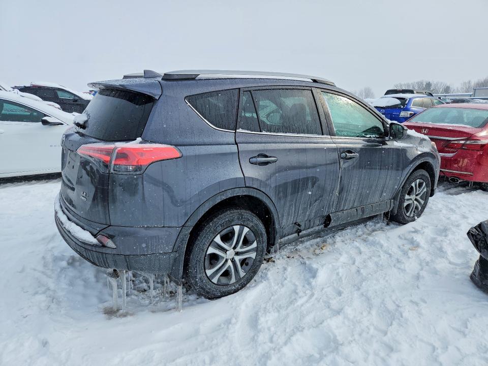 Photo 3 from auction – 2018 TOYOTA RAV4 LE with VIN 2T3BFREV6JW820113