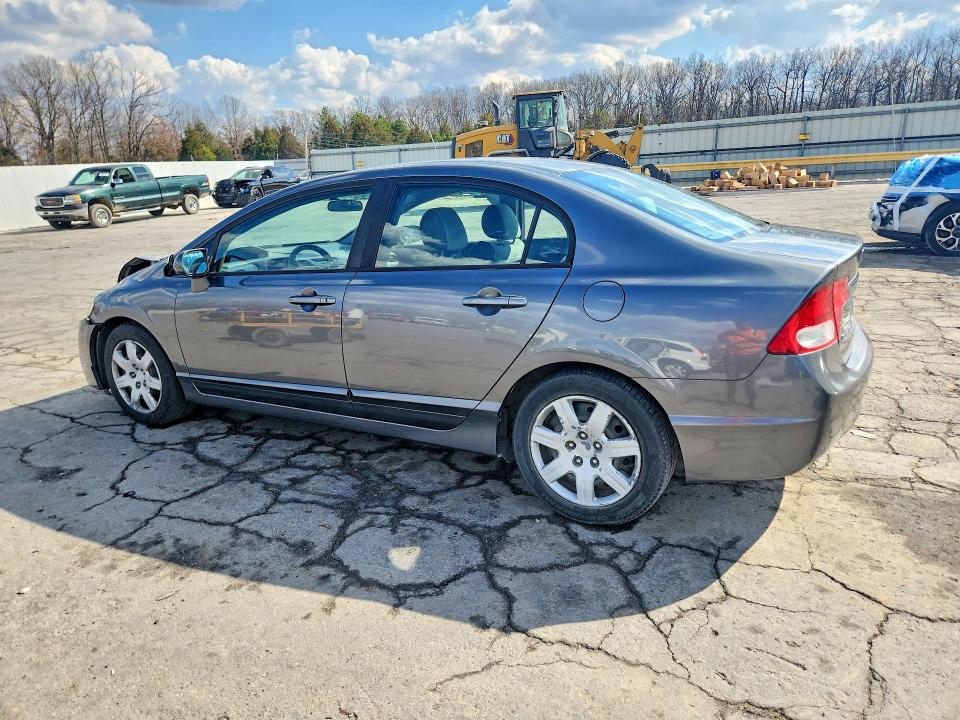 Photo 2 from auction – 2010 HONDA CIVIC with VIN 19XFA1F50AE038692