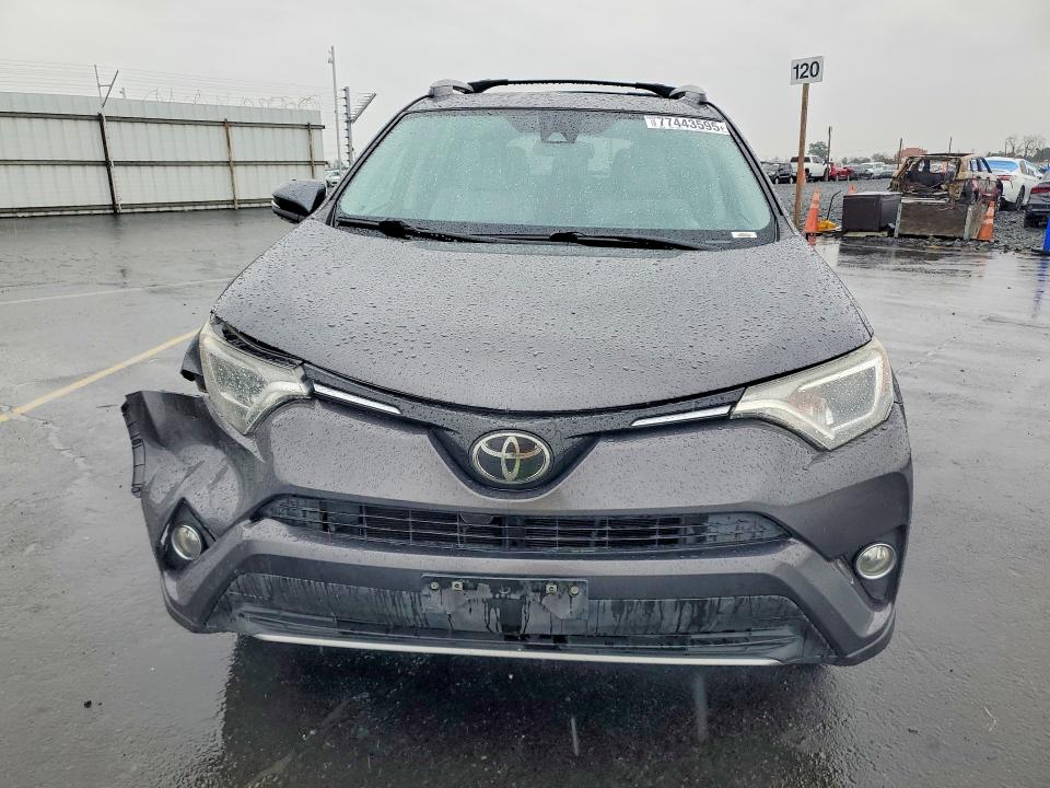 Photo 5 from auction – 2018 TOYOTA RAV4 with VIN 2T3WFREV0JW506250