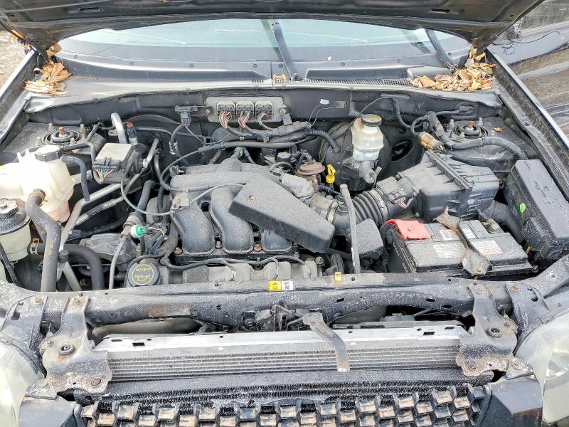 Photo 12 from auction – 2006 FORD ESCAPE with VIN 1FMYU94106KB56014