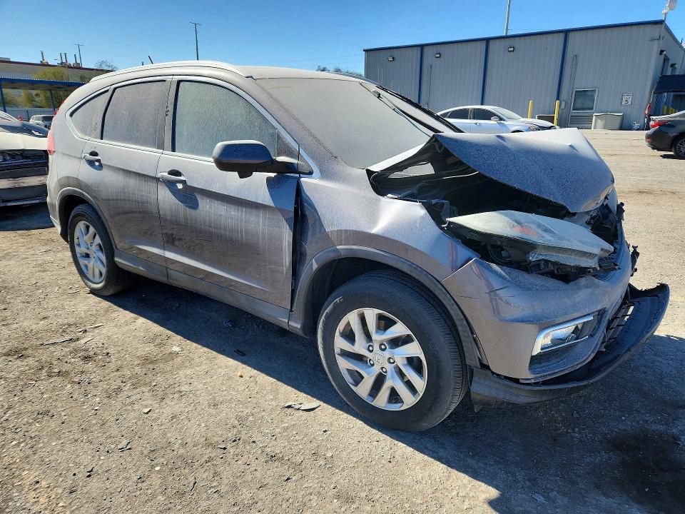 Photo 4 from auction – 2016 HONDA CR-V EXL with VIN 2HKRM4H77GH679203