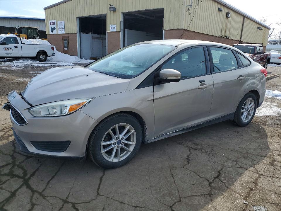 FORD FOCUS SE 2015 with VIN 1FADP3F29FL237719 - Photo from auction