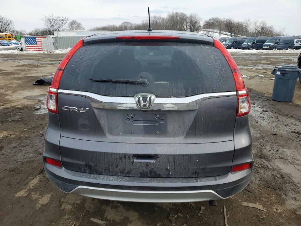 Photo 6 from auction – 2015 HONDA CR-V with VIN 2HKRM3H57FH506918