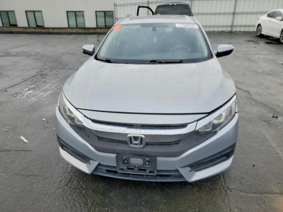 Photo 5 from auction – 2016 HONDA CIVIC EX with VIN 19XFC2F73GE231168