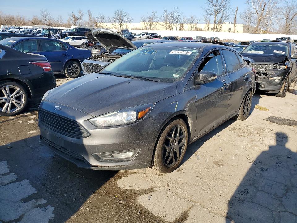 FORD FOCUS 2016 with VIN 1FADP3FE1GL212485 - Photo from auction