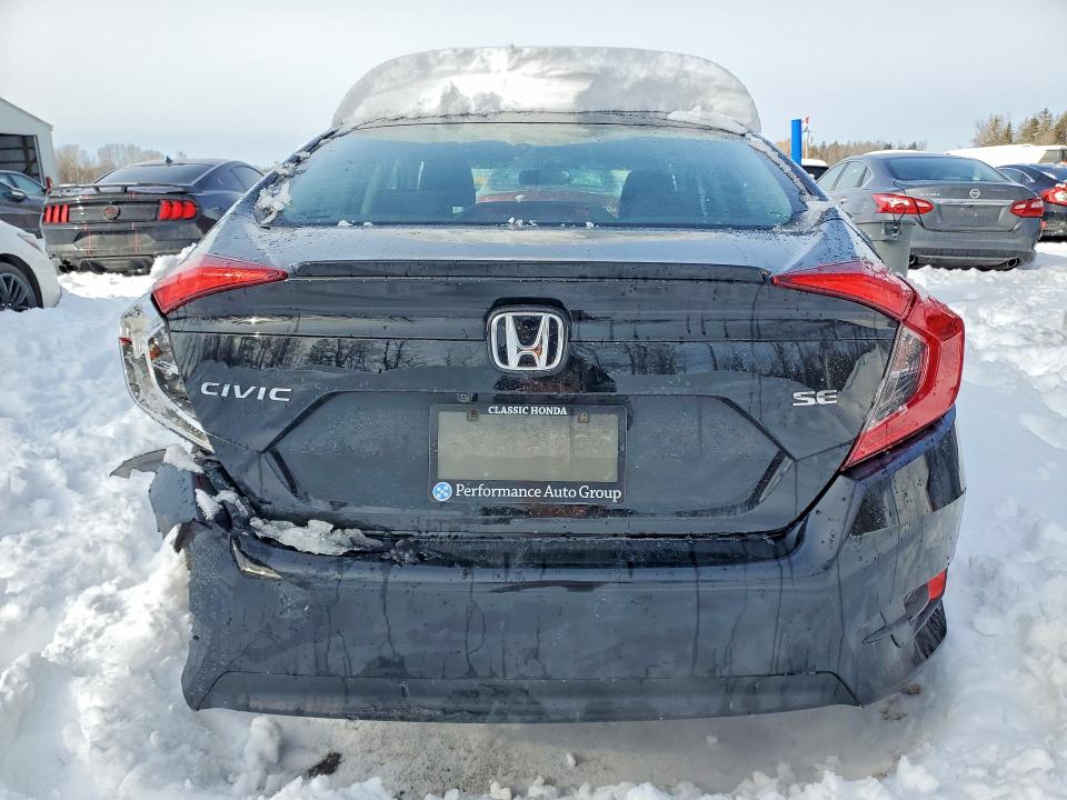 Photo 6 from auction – 2018 HONDA CIVIC with VIN 2HGFC2F64JH015723