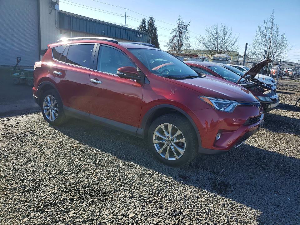 Photo 4 from auction – 2018 TOYOTA RAV4 LIMIT with VIN 2T3DFREV7JW845563