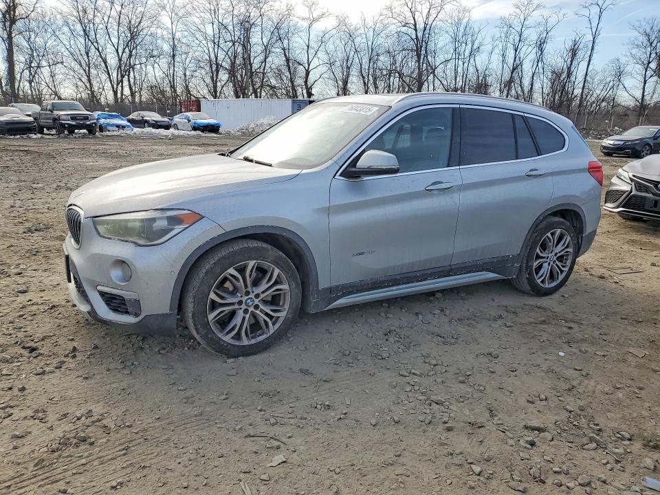 BMW X1 XDRIVE2 2017 with VIN WBXHT3Z39H4A55257 - Photo from auction