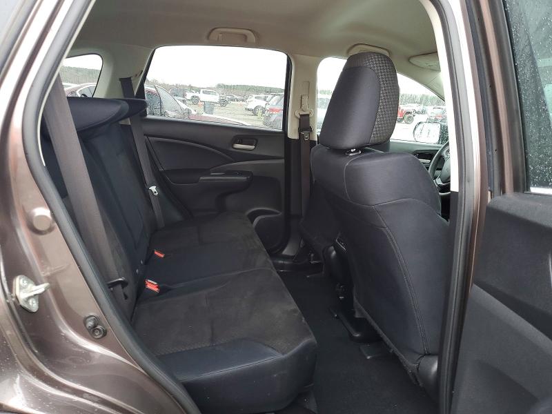 Photo 10 from auction – 2016 HONDA CR-V SE with VIN 2HKRM3H40GH541776