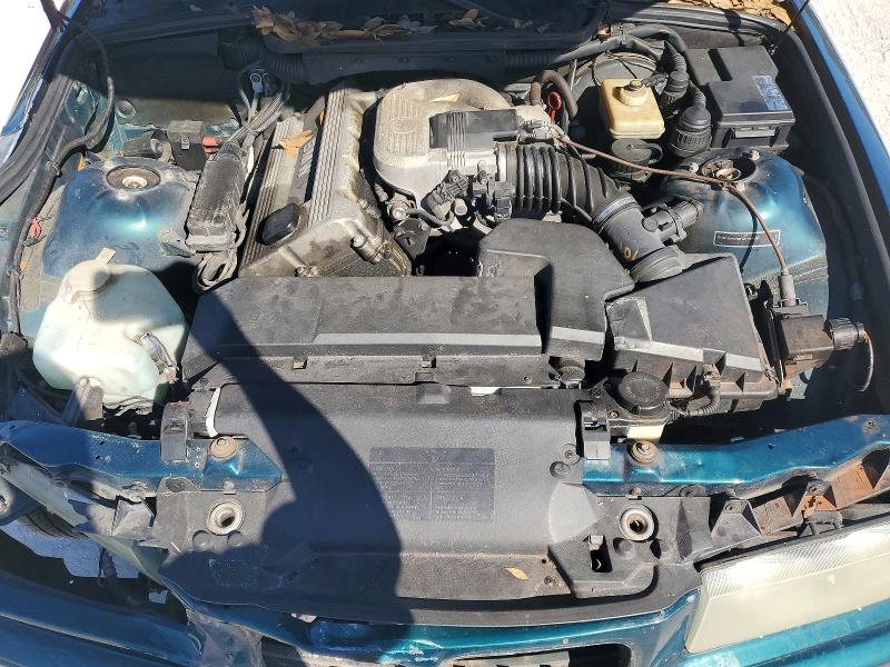 Photo 11 from auction – 1997 BMW 318 IC with VIN WBABH7325VEY01795