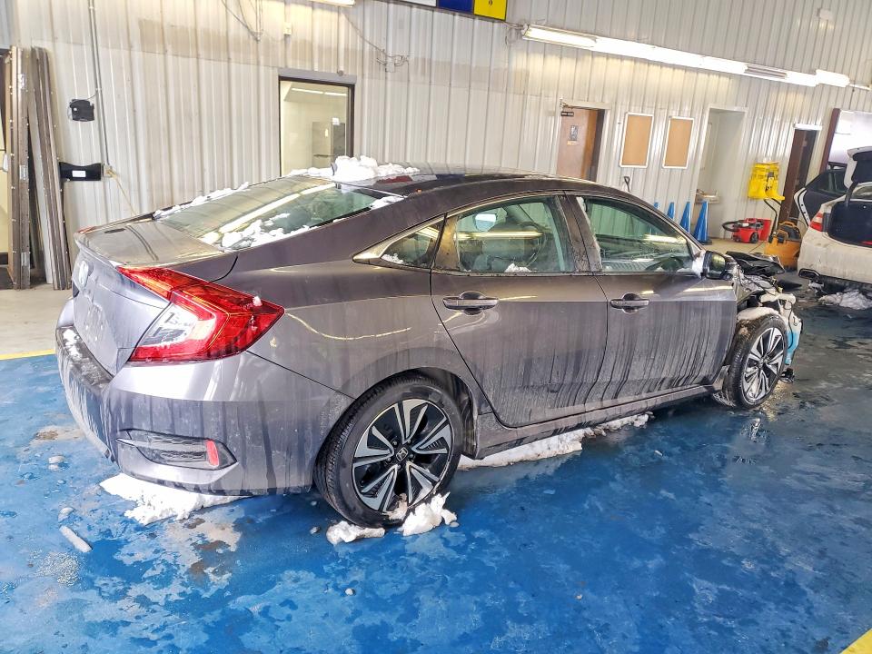 Photo 3 from auction – 2018 HONDA CIVIC with VIN 19XFC1F71JE003297