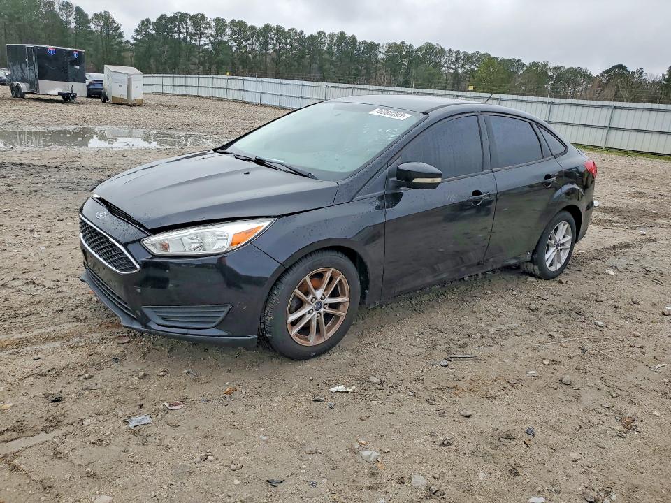 FORD FOCUS 2015 with VIN 1FADP3F24FL263032 - Photo from auction