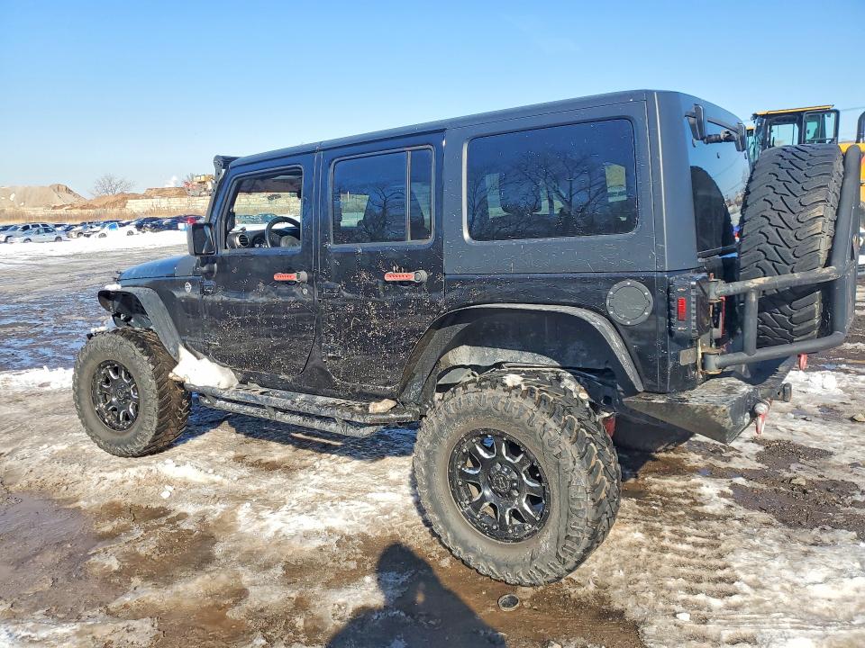 Photo 2 from auction – 2014 JEEP WRANGLER U with VIN 1C4BJWDG7EL309552