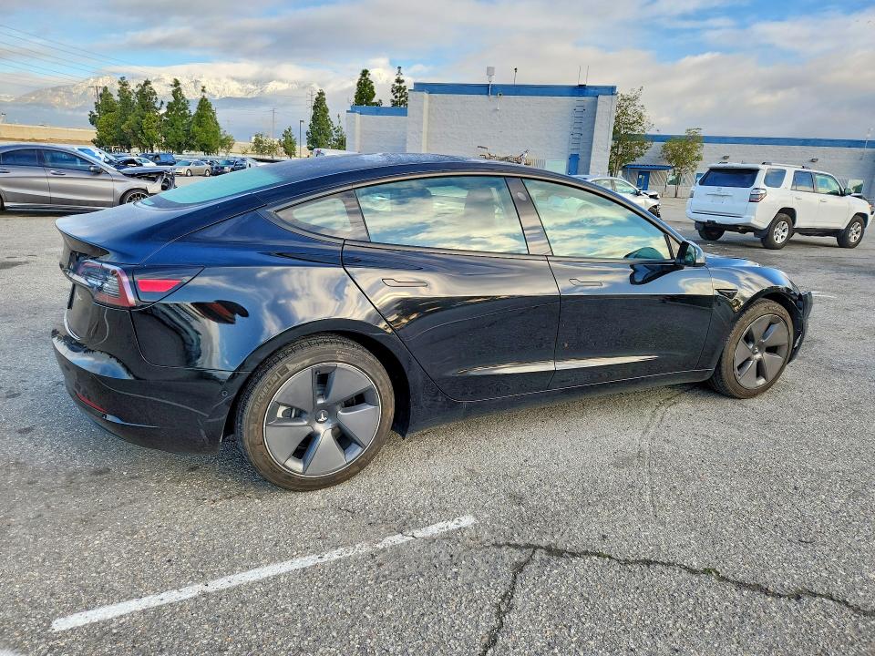 Photo 3 from auction – 2021 TESLA MODEL 3 with VIN 5YJ3E1EA6MF067019