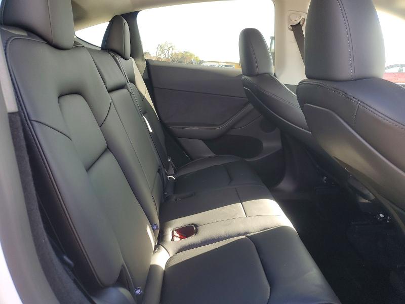 Photo 11 from auction – 2025 TESLA MODEL Y with VIN 7SAYGDED9SF321592