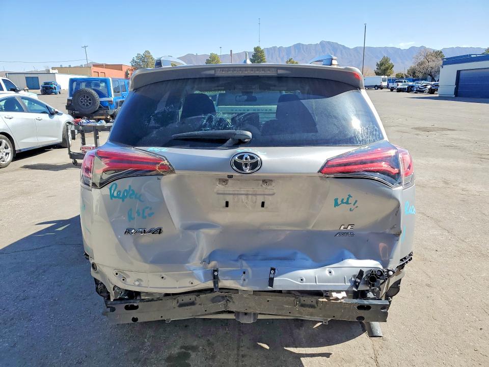 Photo 6 from auction – 2018 TOYOTA RAV4 LE with VIN JTMBFREV3JJ236802