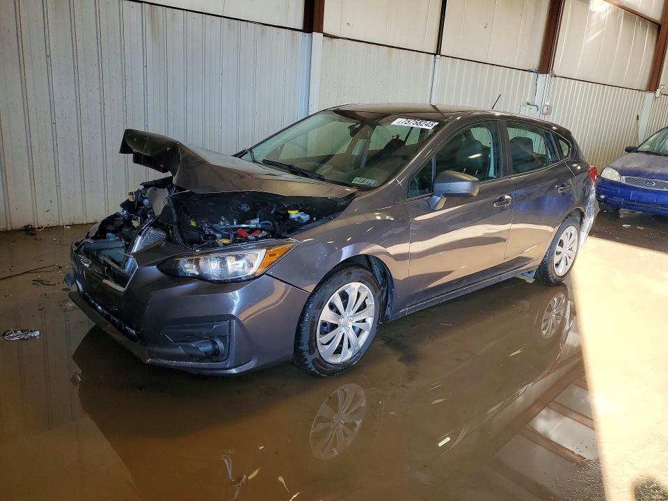SUBARU IMPREZA 2018 with VIN 4S3GTAA66J3730011 - Photo from auction