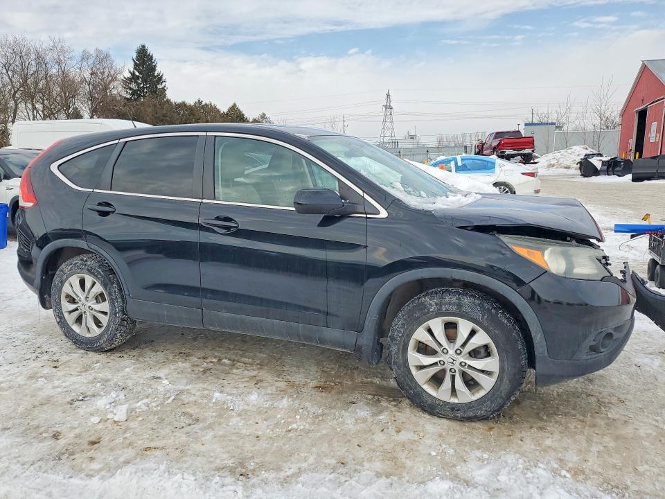 Photo 4 from auction – 2013 HONDA CR-V with VIN 2HKRM4H59DH100562