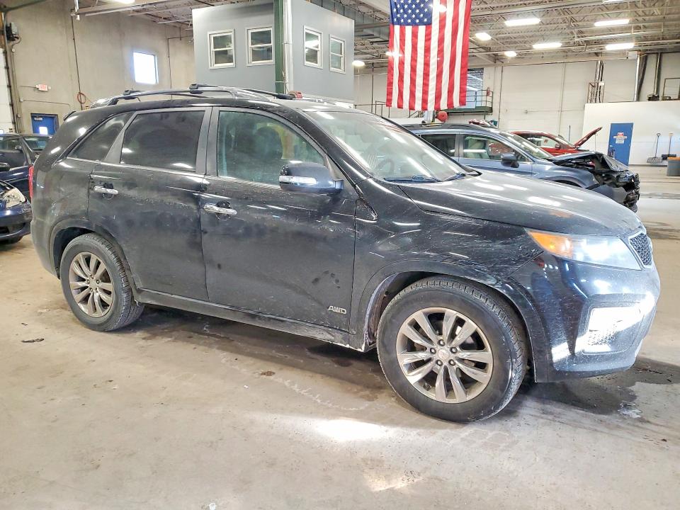 Photo 4 from auction – 2012 KIA SORENTO SX with VIN 5XYKWDA23CG255447