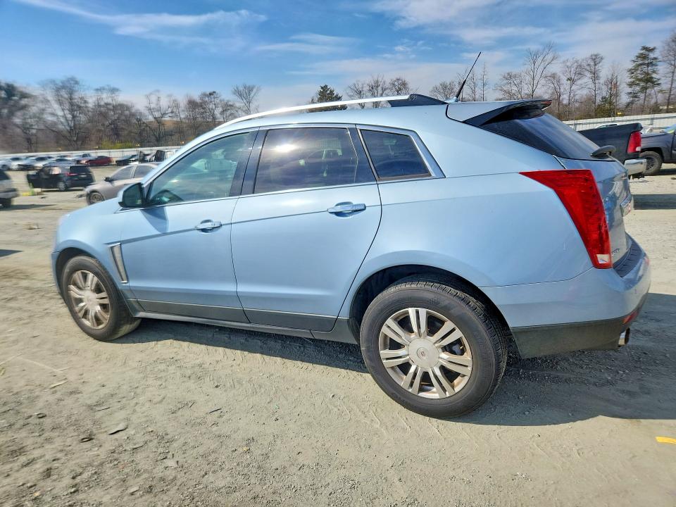 Photo 2 from auction – 2014 CADILLAC SRX LUXURY with VIN 3GYFNEE31ES516647