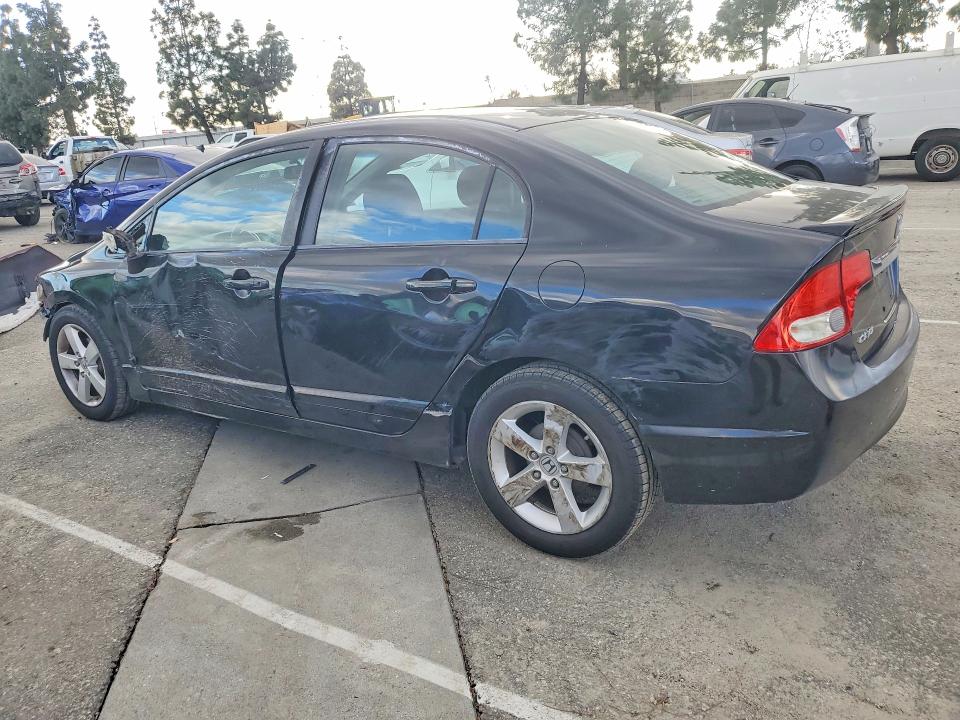 Photo 2 from auction – 2011 HONDA CIVIC with VIN 2HGFA1F65BH547337