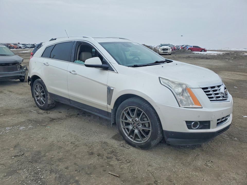 Foto 4 de la subasta – 2015 CADILLAC SRX con VIN 3GYFNCE37FS566376