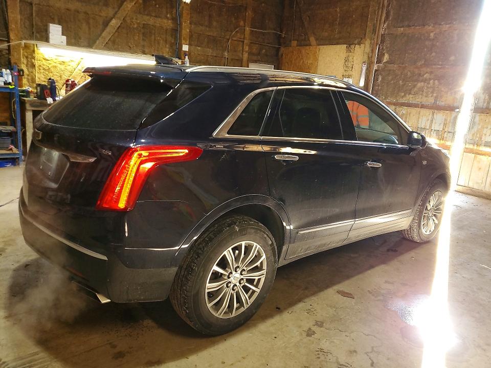 Photo 3 from auction – 2017 CADILLAC XT5 LUXURY with VIN 1GYKNDRS1HZ251553