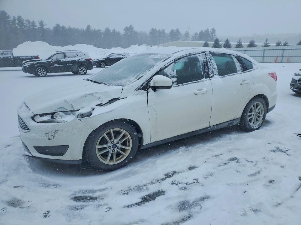 FORD FOCUS 2018 with VIN 1FADP3F23JL219354 - Photo from auction