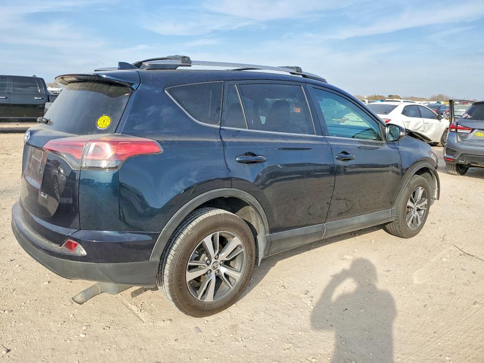 Photo 3 from auction – 2018 TOYOTA RAV4 with VIN 2T3WFREV9JW432567