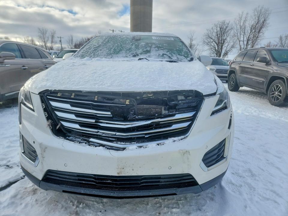 Photo 5 from auction – 2017 CADILLAC XT5 with VIN 1GYKNCRS9HZ203230