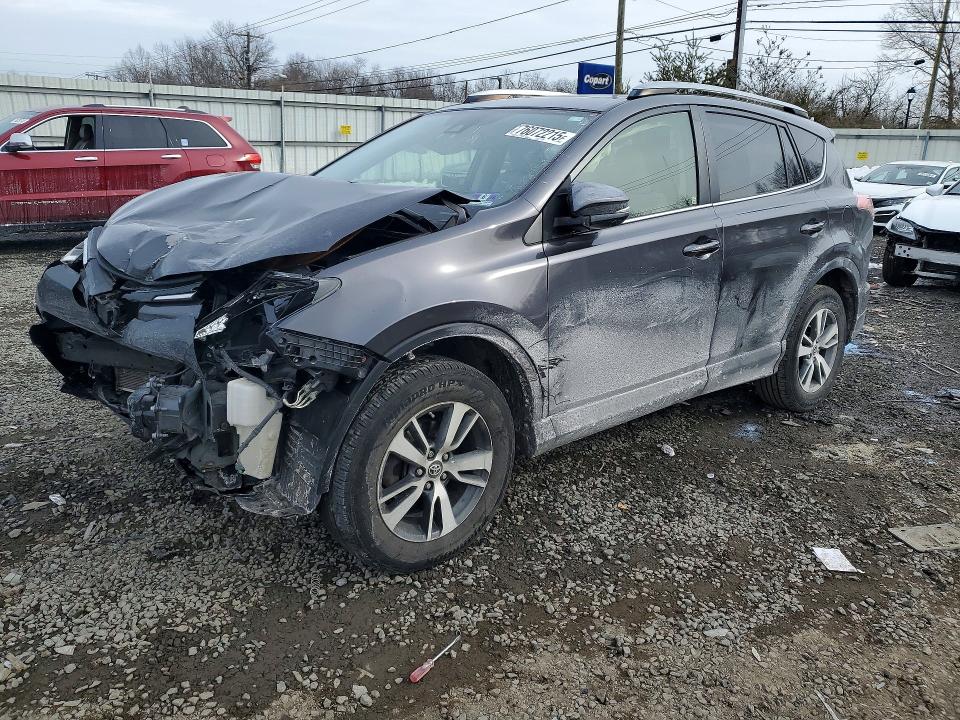 TOYOTA RAV4 XLE 2017 with VIN JTMRFREV2HJ137087 - Photo from auction