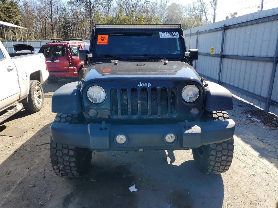 Foto 5 de la subasta – 2012 JEEP WRANGLER U con VIN 1C4BJWFG0CL104228
