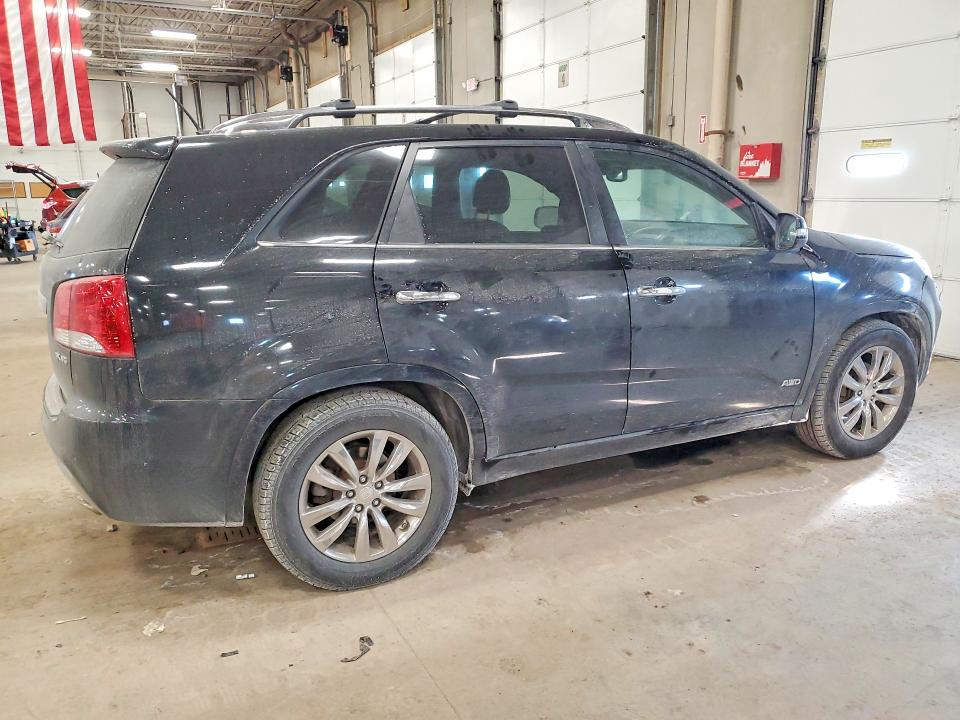 Photo 3 from auction – 2012 KIA SORENTO SX with VIN 5XYKWDA23CG255447