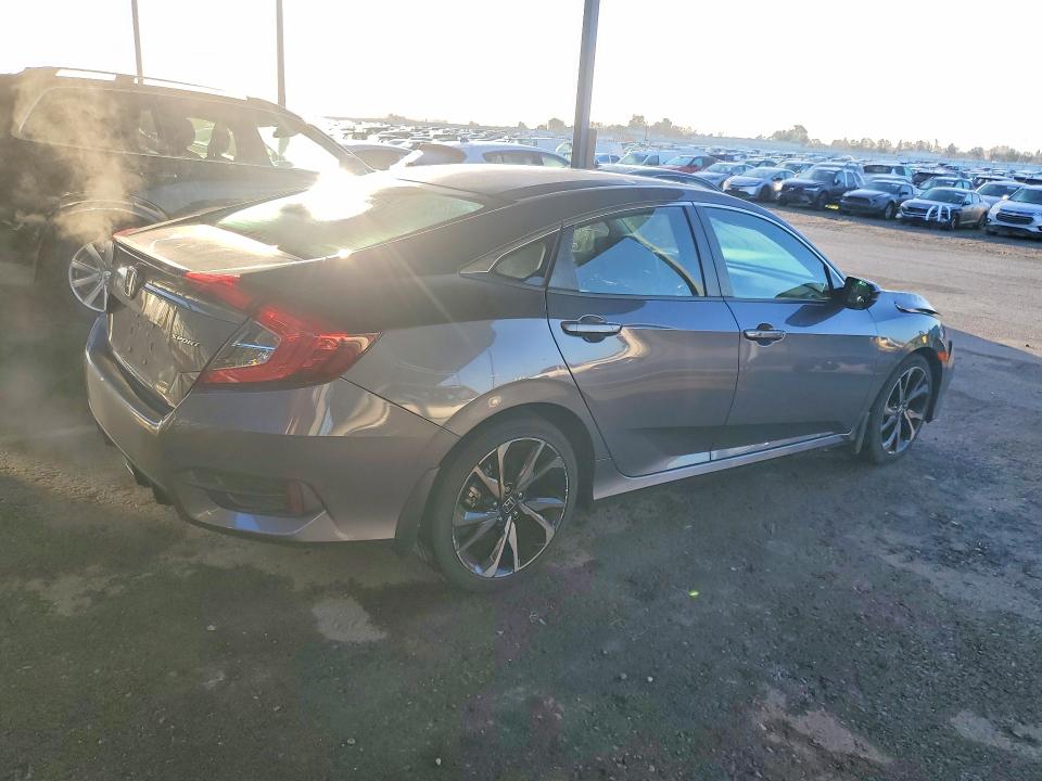 Photo 3 from auction – 2021 HONDA CIVIC SPOR with VIN 2HGFC2F82MH529365
