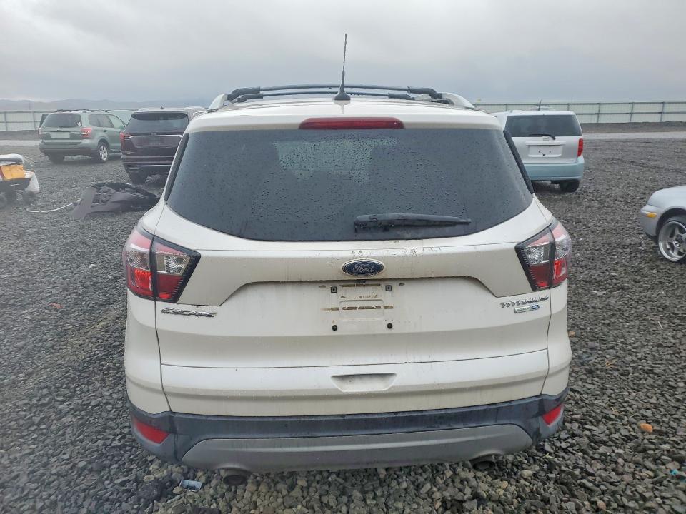 Photo 6 from auction – 2018 FORD ESCAPE with VIN 1FMCU9J90JUC62142