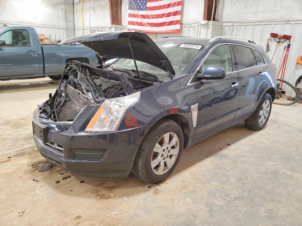 CADILLAC SRX 2015 with VIN 3GYFNBE31FS569462 - Photo from auction