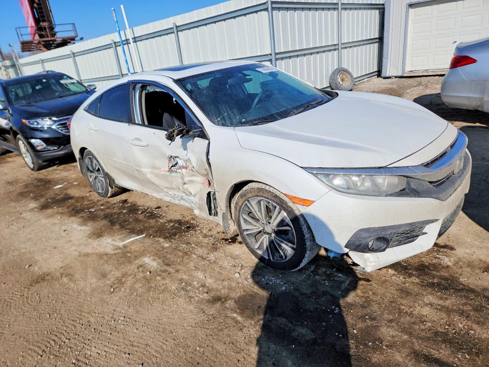 Photo 4 from auction – 2018 HONDA CIVIC with VIN 2HGFC1F70JH643409
