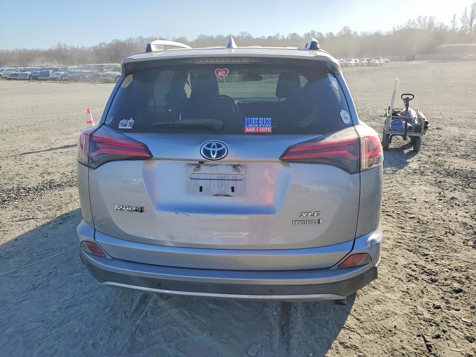 Photo 6 from auction – 2018 TOYOTA RAV4 HV LE with VIN JTMRJREV8JD240338